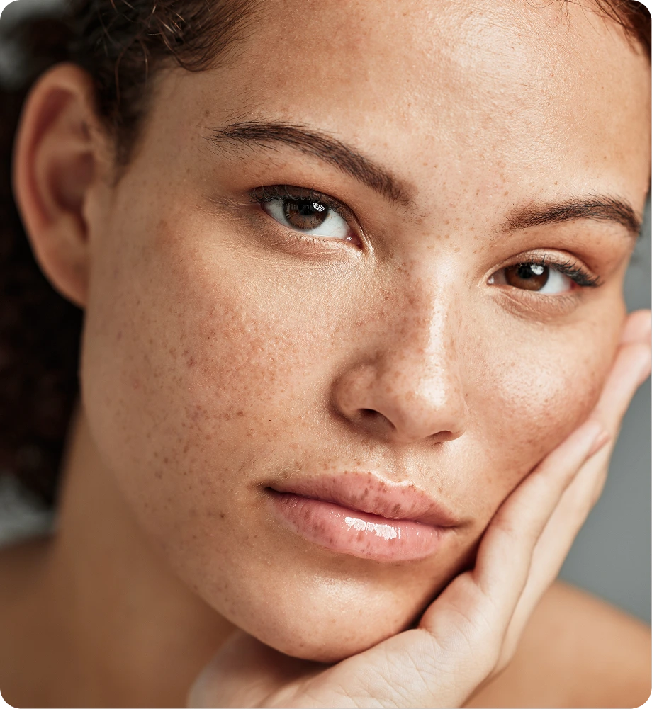 Close-up of a woman's face showing skin texture and complexion
